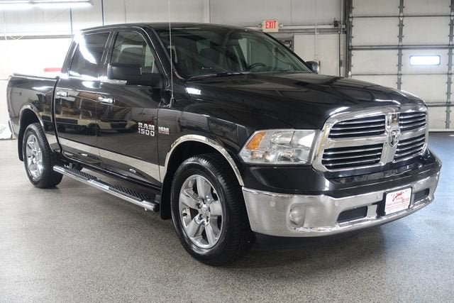 2017 RAM 1500 Big Horn in Brilliant Black Crystal Pearlcoat — front three-quarter view