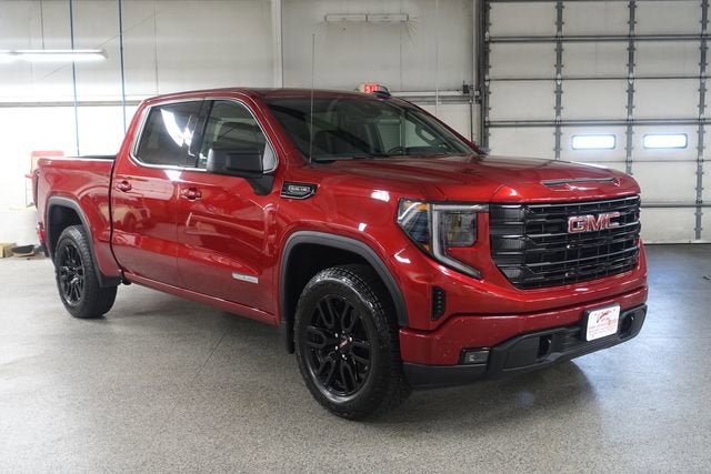 2024 GMC Sierra 1500 Elevation in Volcanic Red Tintcoat — front three-quarter view